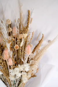 Neutral Tones Dried Fower Arrangement with Wheath, Straw Flower, Teasels, and Bunny Tails